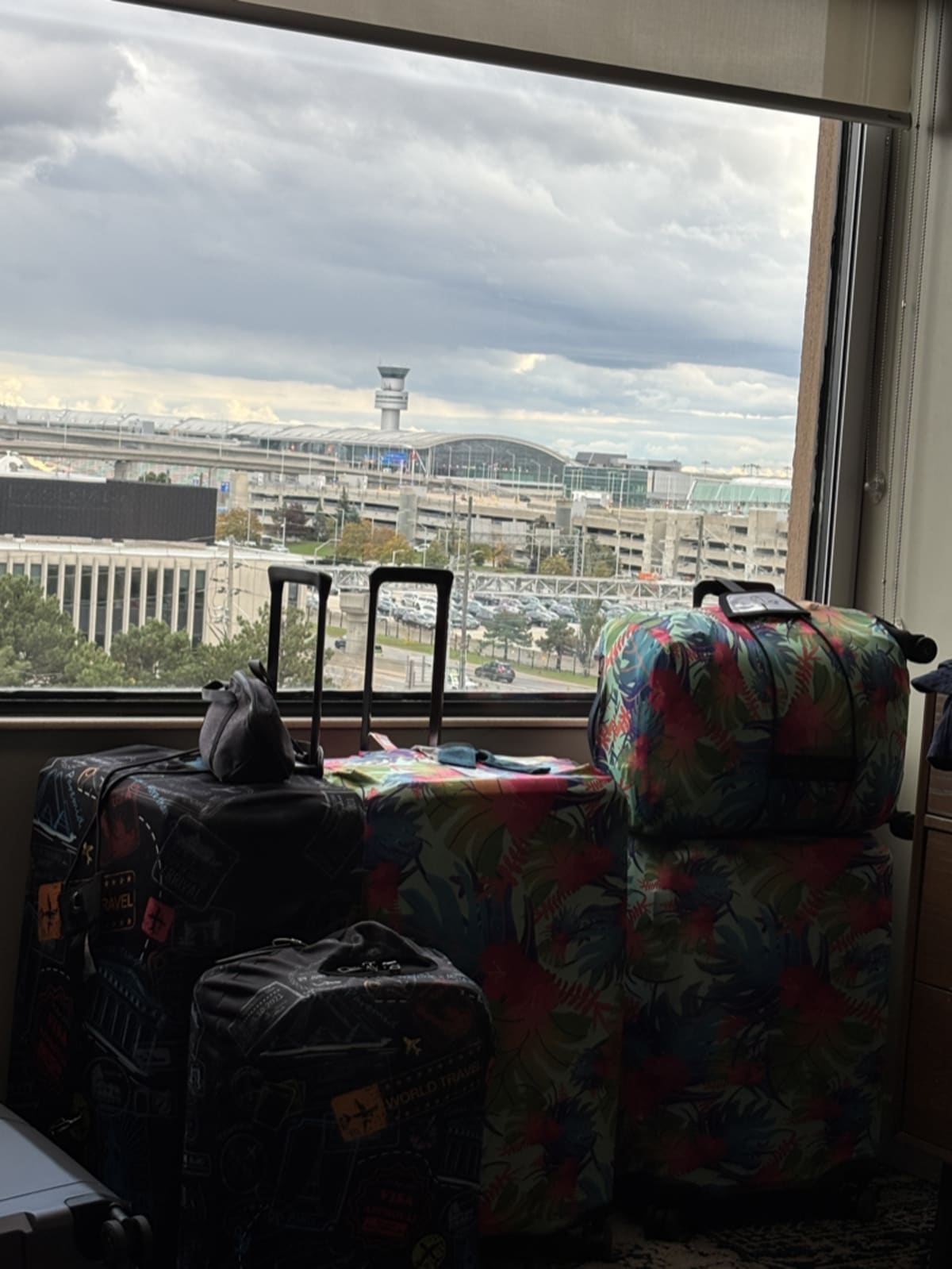 Airport terminal with travelers booking flights ahead
