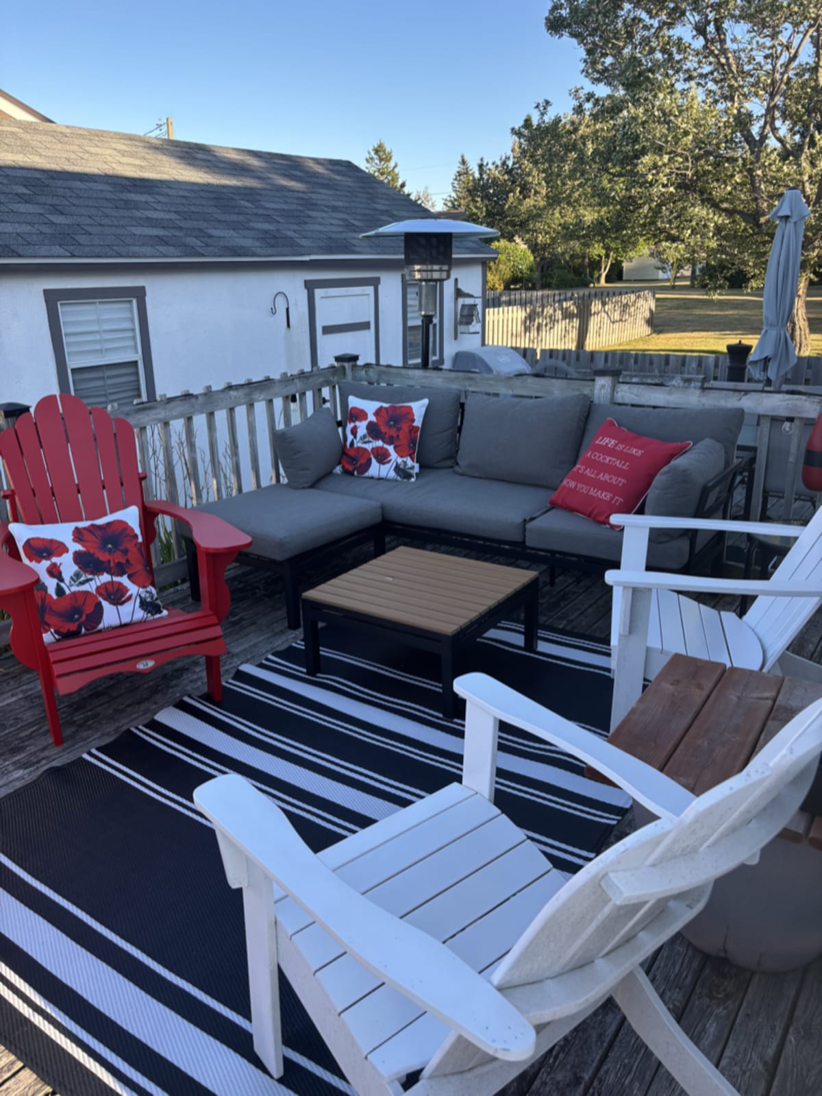 Cottage deck ready for the season with outdoor furniture