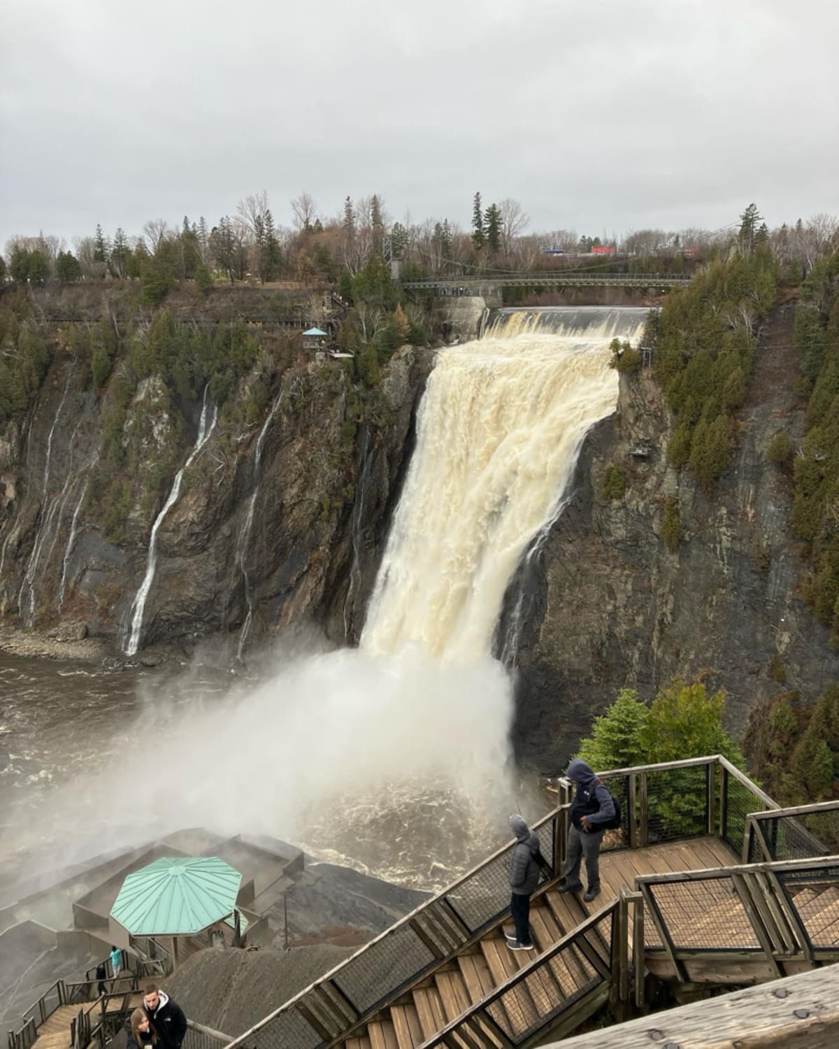 Beautiful waterfall cascading down rocky cliffs in Quebec