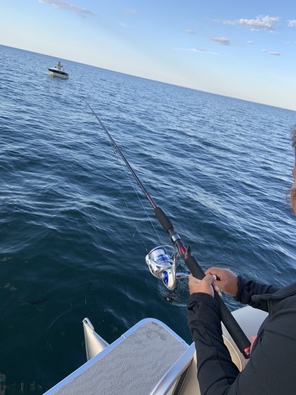Fishing by the ocean capturing the peaceful connection between water and food