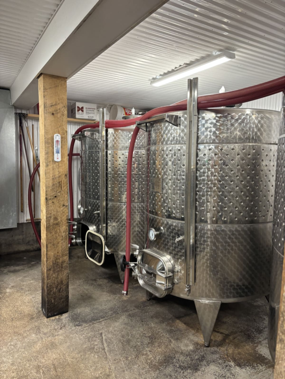 Large fermentation vats inside The Church Brewing facility