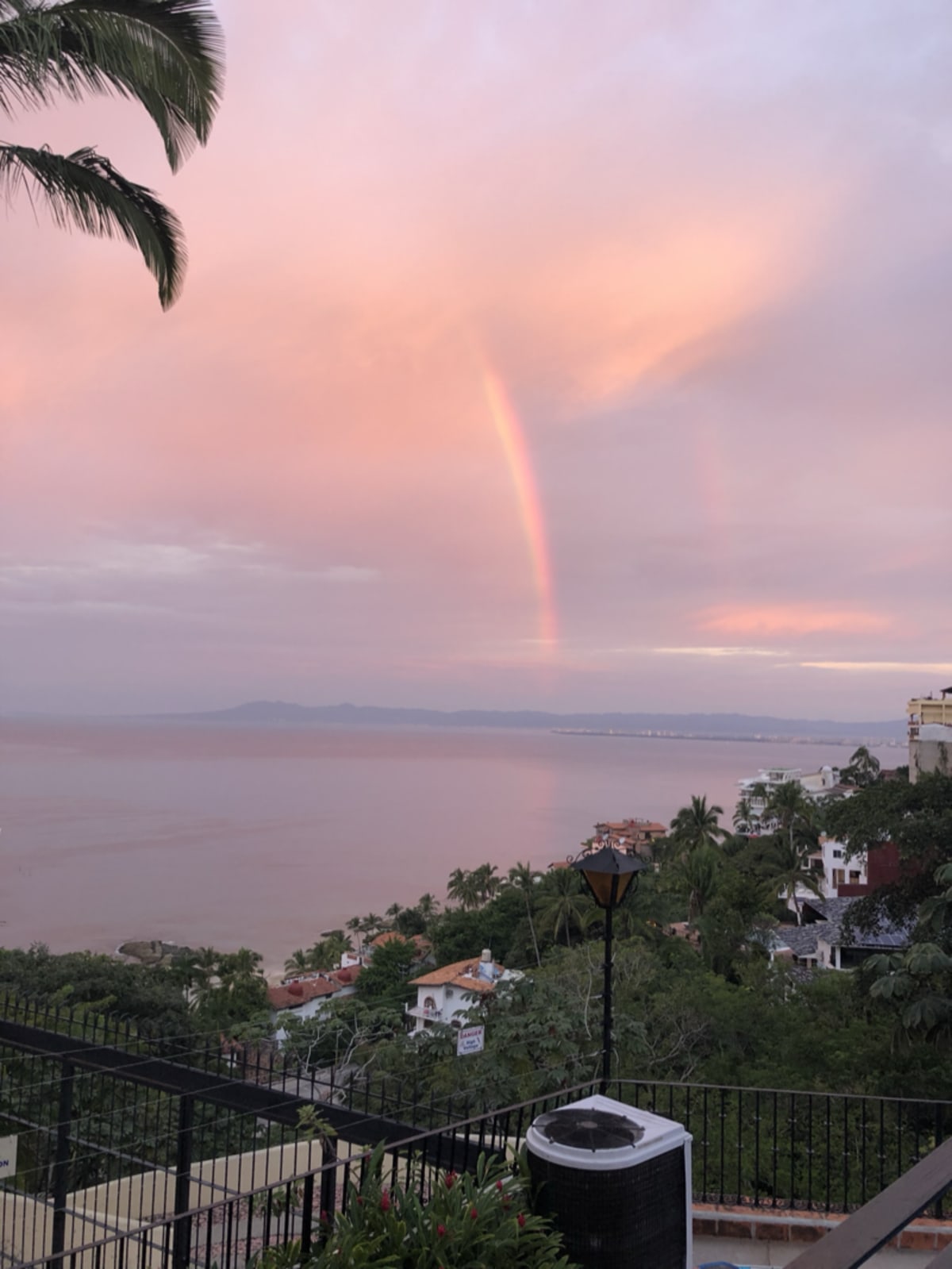 Vibrant rainbow over Puerto Vallarta skyline