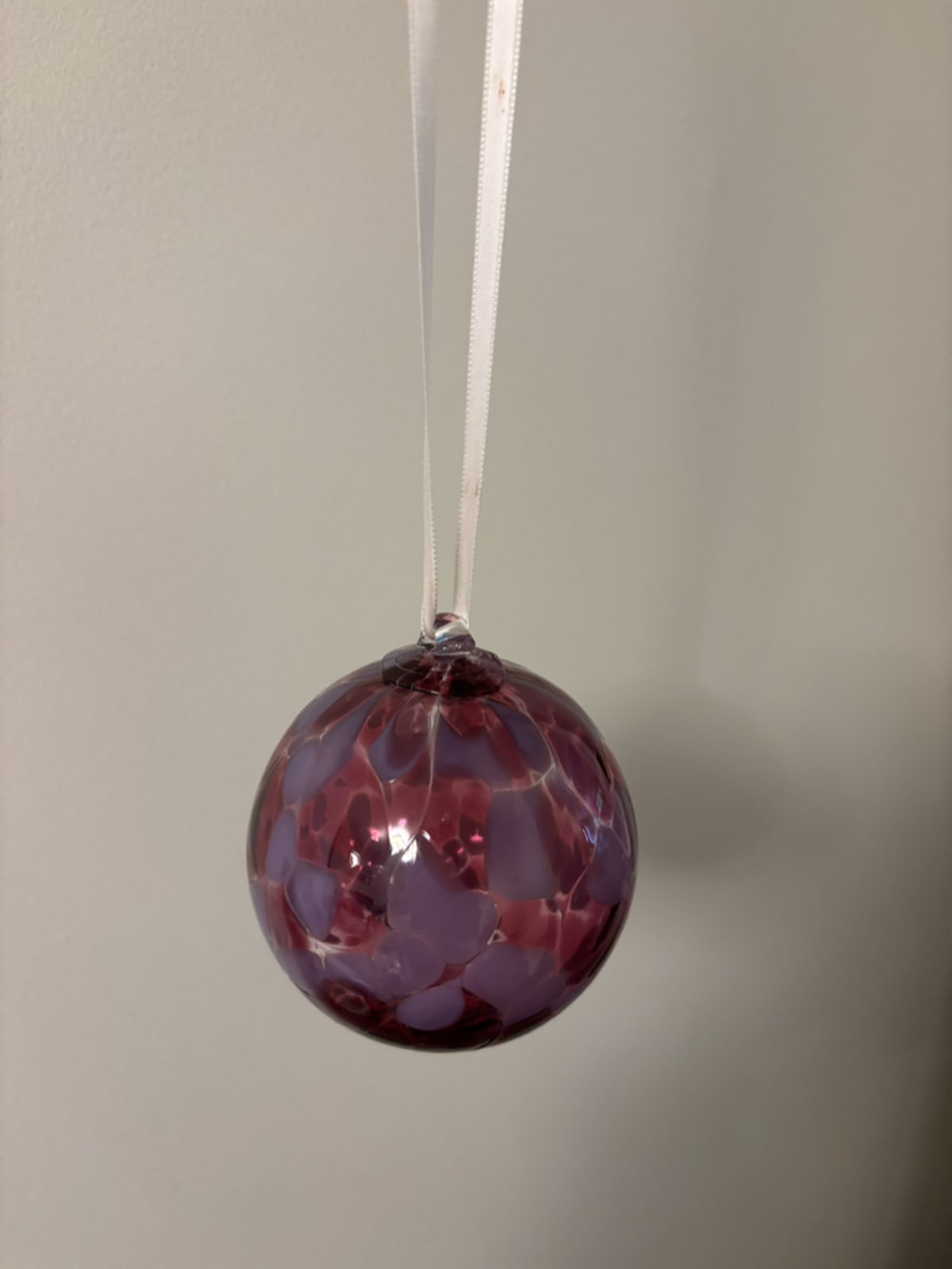 Red globe symbolizing world travel adventures