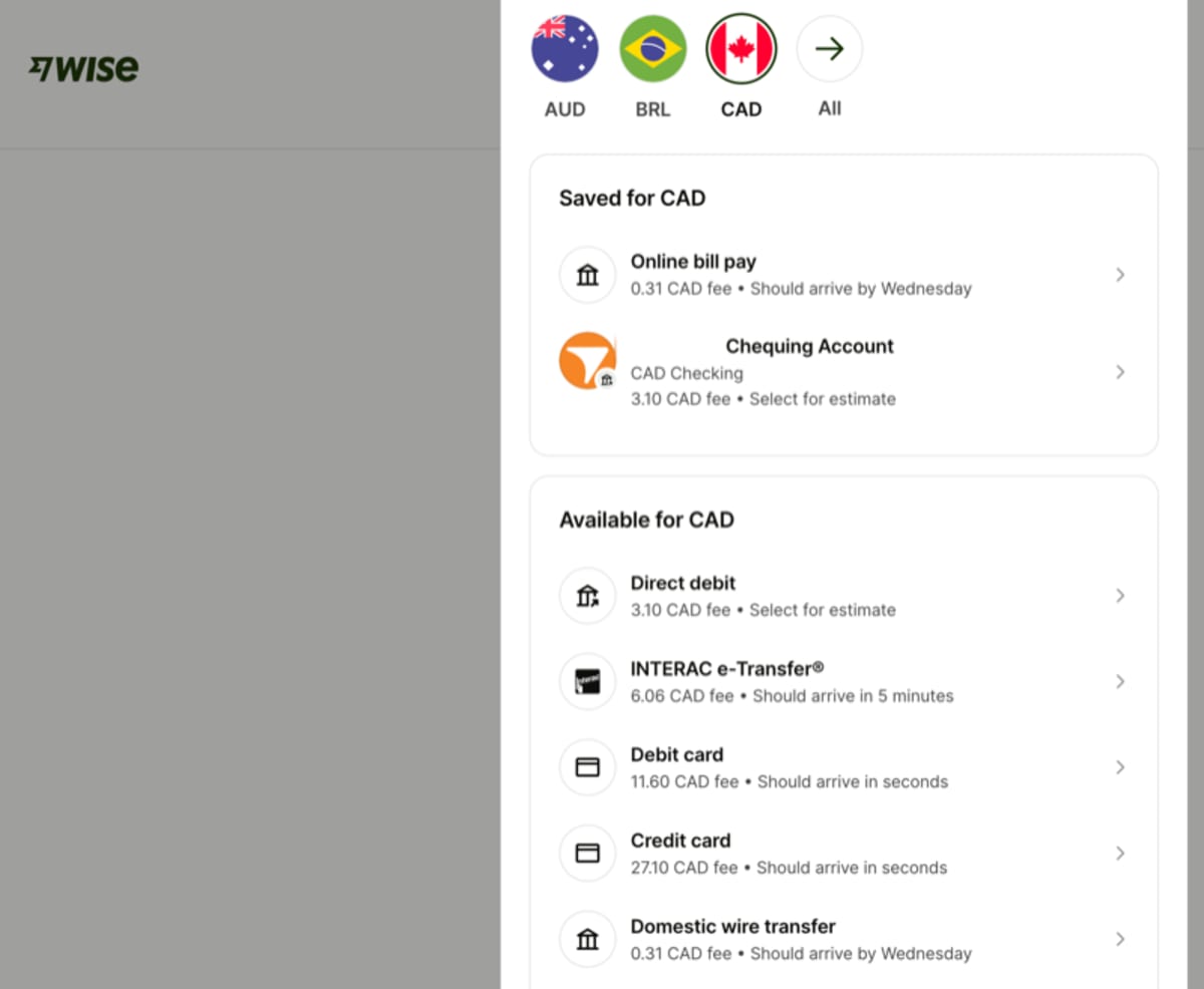 Wise fee comparison showing online bill pay at 0.31 CAD fee versus Interac e-Transfer at 6.06 CAD and debit card at 11.60 CAD